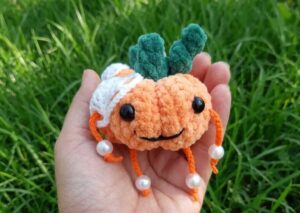 Free Crochet Leggy Pumpkin Plushie with Cobweb Pattern for Fall & Halloween