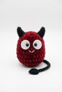 Tester Pattern: How to Crochet A Cape-Wearing Red Buddy Plushie for Halloween